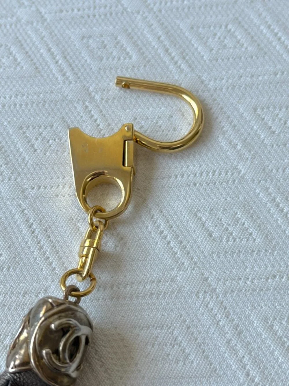 CC keychain gold with bronze leather fringe vintage